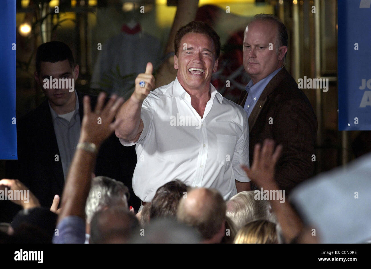 California Governor Arnold Schwarzenegger gives a thumbs up to supporters as he prepares to leave a 'citizens rally' at Sherwood Mall in Stockton, CA on Sunday, July 18, 2004. The governor urged those in attendance to contact their legislators and tell them to support the governor's budget.  (Sacram Stock Photo