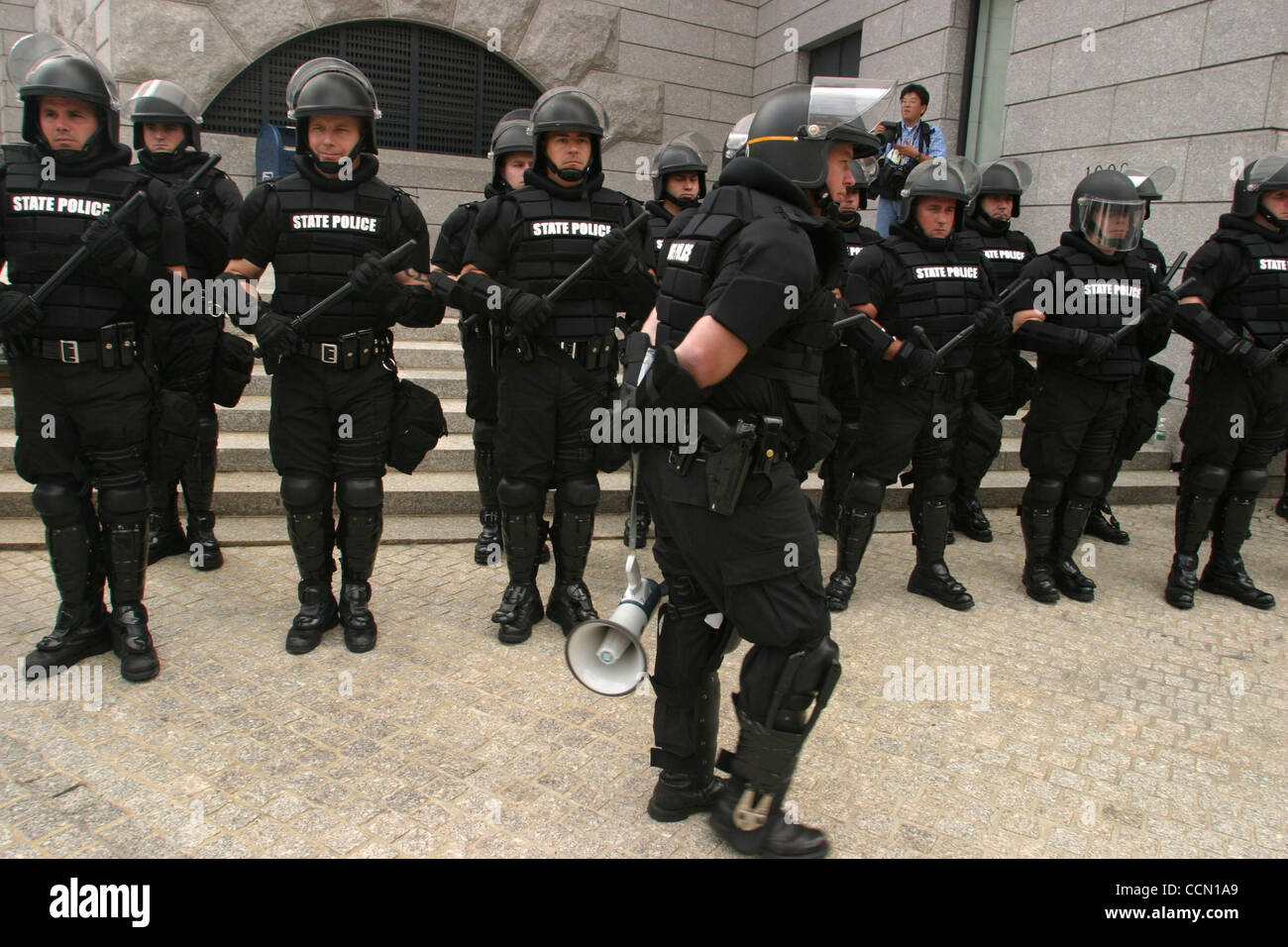 Jul 25, 2004; Boston, MA, USA; State Police in riot gear are out in ...