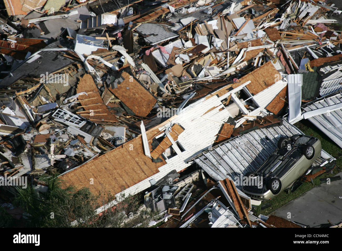 081404 Port Charlotte...Mobile homes and a car are demolished by