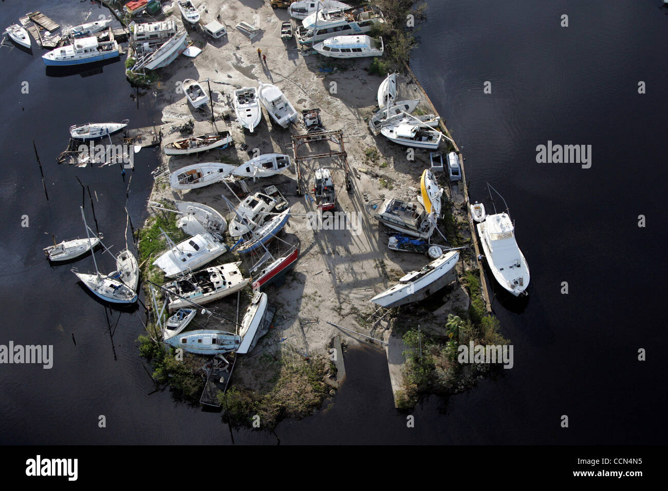 081404 Boats are piled up on the North end of Pine Island after hurricane Charley. Staff photo by Allen Eyestone Stock Photo