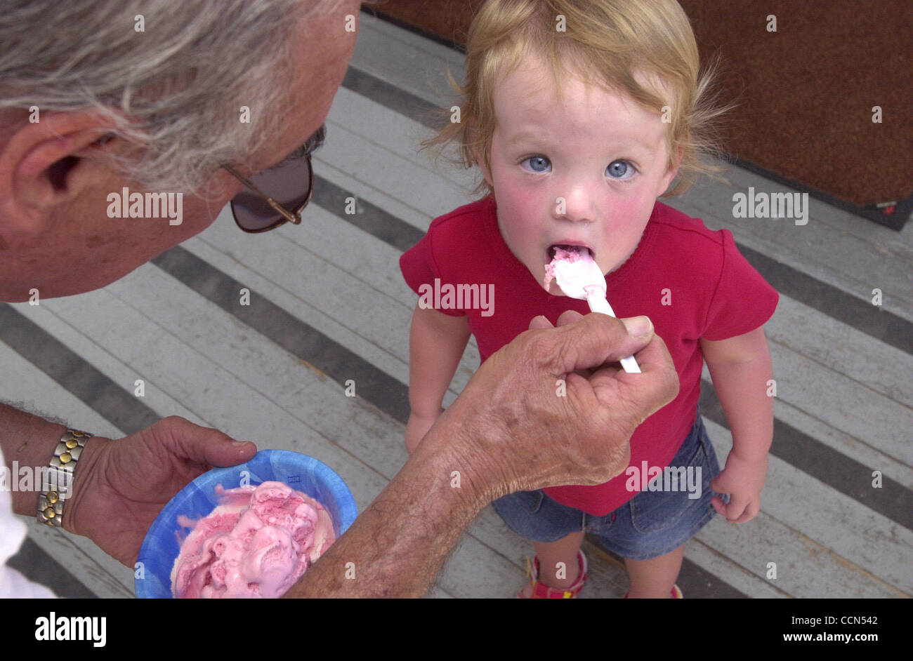 Lenny Rosenberg of Livermore feeds ice cream to his 2-year-old ...