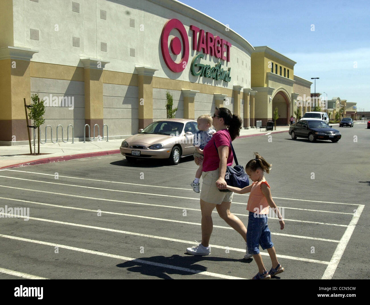 Cassandra Pahl Center Sam Pahl 20 Months Left And Katie Pahl 4 Of Oakley Go Shopping At The New Target Store In The Slatten Ranch Shopping Center In Antioch Calif Monday August