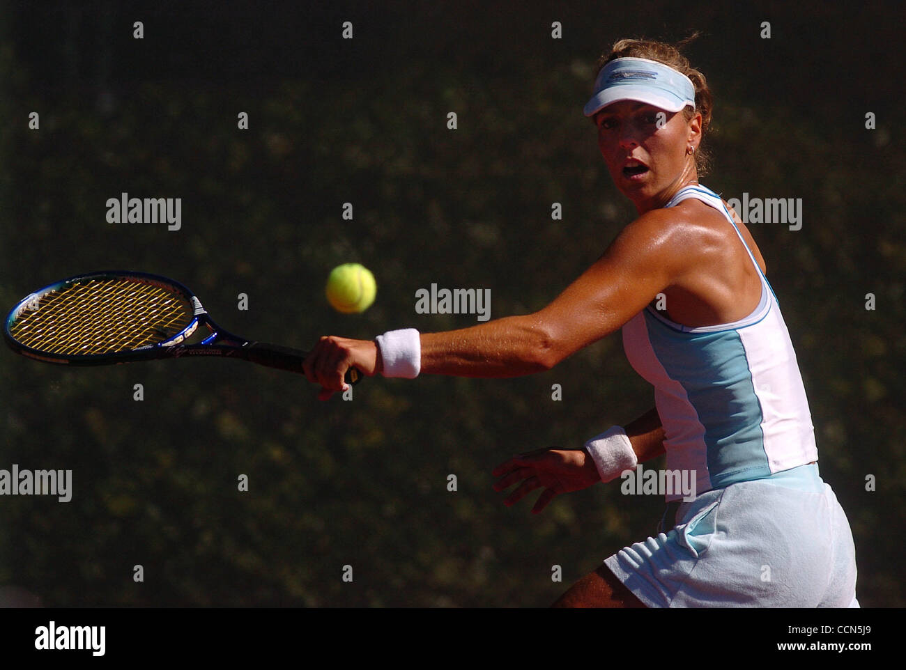 Martina Nejedly returns a volley against Page Bartelt during their semifinal match of the Stead