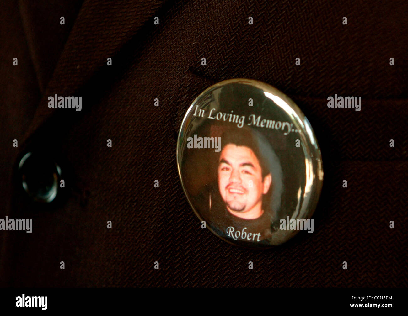 Aug 19, 2004; San Antonio, TX, USA; A mourner wears a memorial button