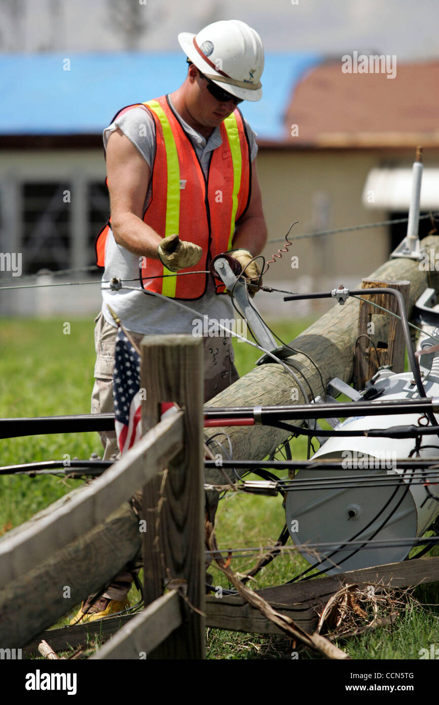 John Williamson Of Pike Electric Works On A Down Power Line In Punta 