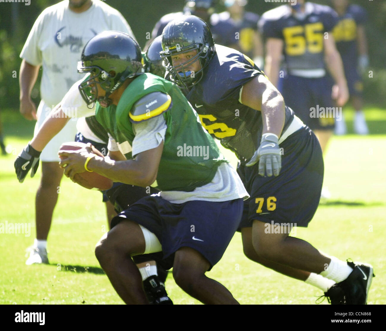 Cal defensive tackle Lorenzo Alexander keys in on a ball carrier during practice in Berkeley, Calif., on Friday, August 27, 2004.                    (Contra Costa Times/Mark DuFrene) Stock Photo