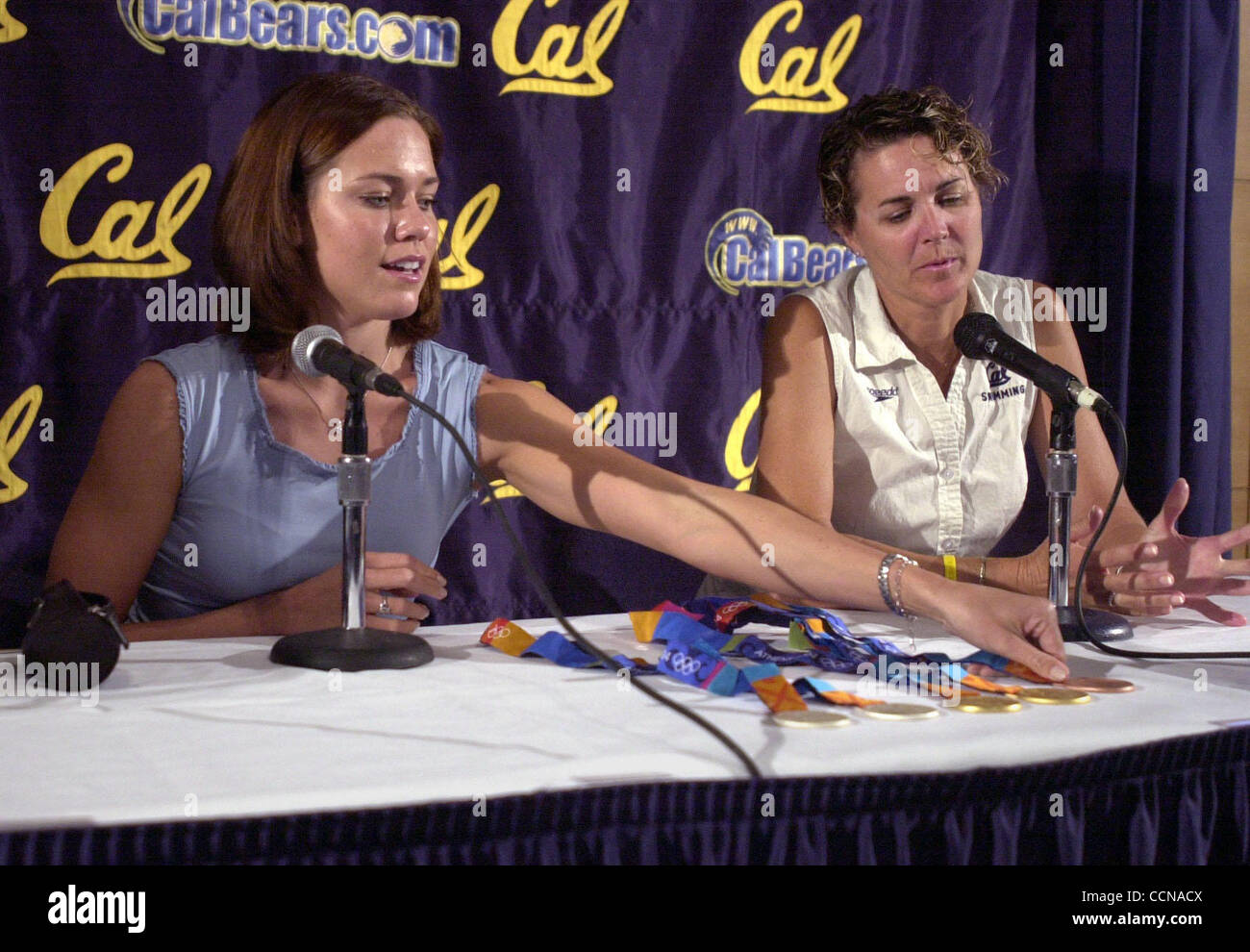 Bay Area Olympic hero Natalie Coughlin (cq) displays her 5 Olympic medals she won at the 2004 Summer Olympics held in Athens, Greece during a press conference held on the campus of U.C. Berkeley in Berkeley, Calif. on Wednesday, September 1, 2004. Coughlin, from Concord, Calif., won 2 gold medals, 2 Stock Photo