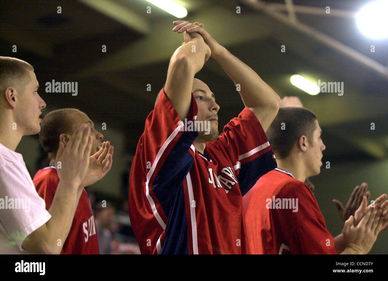 (For future Marcus Thompson feature) Saint Mary's College basketball player Jordan Boreman cheers on his team as they take on Loyola Marymount University at Saint Mary's in Moraga, Calif. Thursday, February 26, 2004. (Contra Costa Newspapers/Kristopher Skinner) Stock Photo
