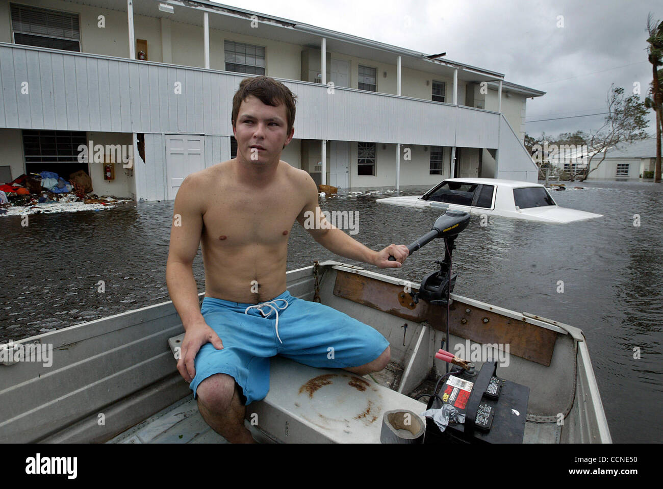 092604 met jeanneVero BeachJosh Kyle, motors his boat through his