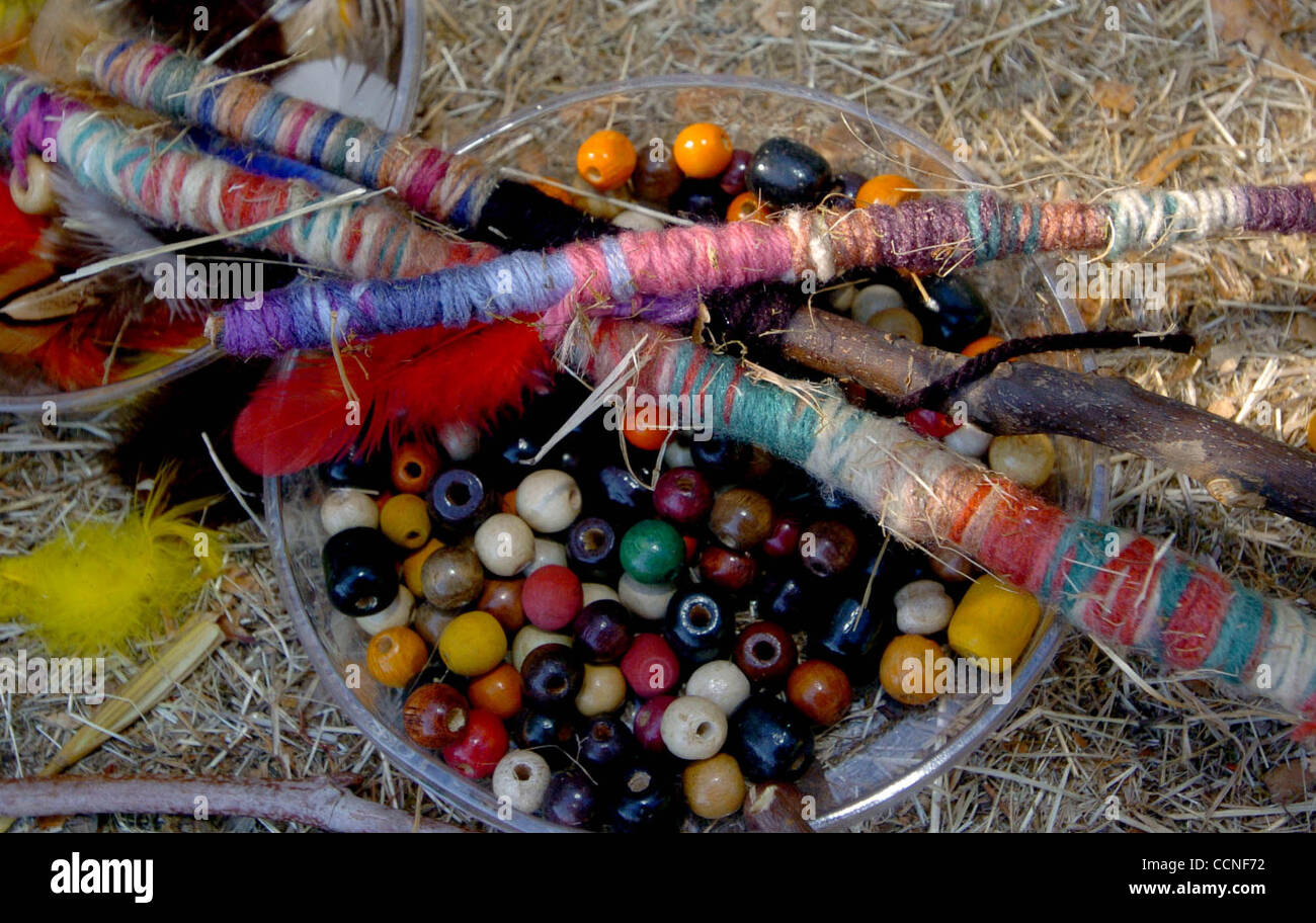 Items used to make a prayer stick, stick, yarn, beads, feathers and a prayer during Native American Day at Rheem Elementary school in Moraga Thursday September 23,2004. A prayer stick is a memento that some Native Americans use as a gift to carry goodwill and good wishes. (Contra Costa Times/Bob Lar Stock Photo