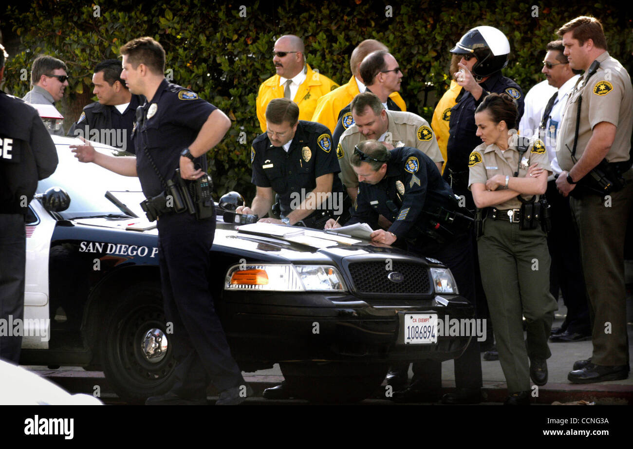 Law Enforcement personnel gathered at the command post at Second Avenue