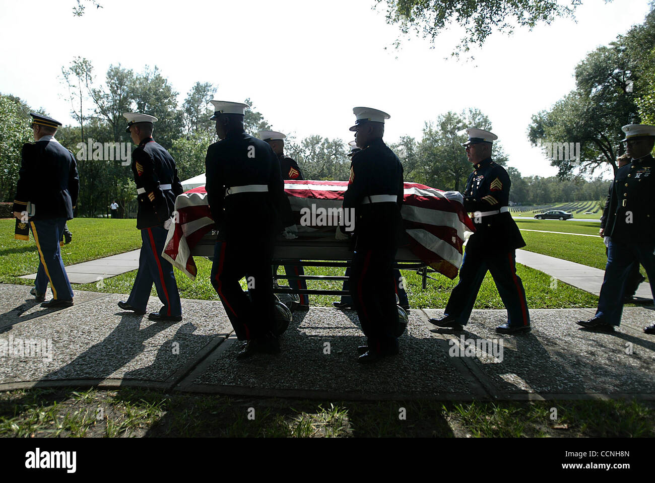 BUSHNELL Marines carry the casket of Lt. Michael Felsberg to assembly