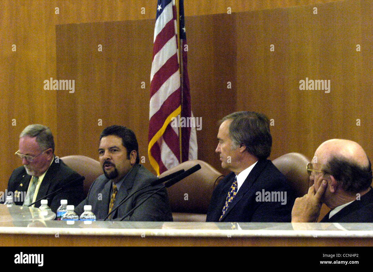 From left, 4 of the 6 Pittsburg City Council challengers Ben Johnson (cq), Lou Rosas (cq), Larry Wirick (cq), and Ronald Johnson (cq) during the Brown, Black and White Candidate Forum in the the city council chambers in Pittsburg, Calif. on Thursday, October 7, 2004.  (Dean Coppola / Contra Costa Ti Stock Photo