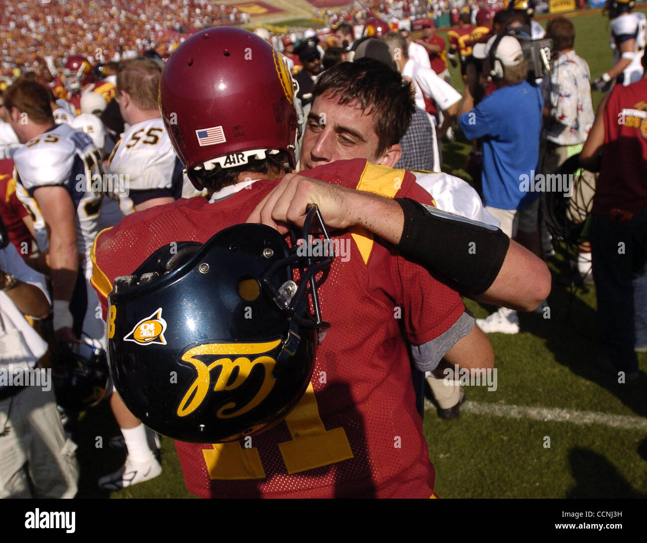 Cal's quarterback Aaron Rodgers, 8, congratulates USC's quarterback
