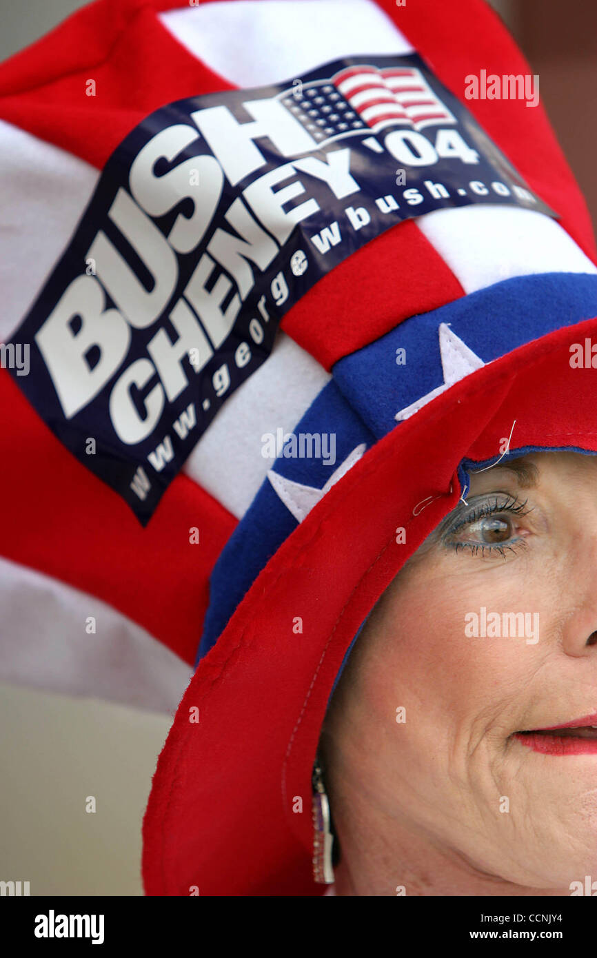 102704 met politics--West Palm Beach--Jan Terrana,cq, of West Palm Beach, wears a hat with a Bush Cheney 04 sticker as she greets people attending a speech by former US congressman J.C. Watts at the Redemptive Life Fellowship. Staff photo by Greg Lovett Stock Photo