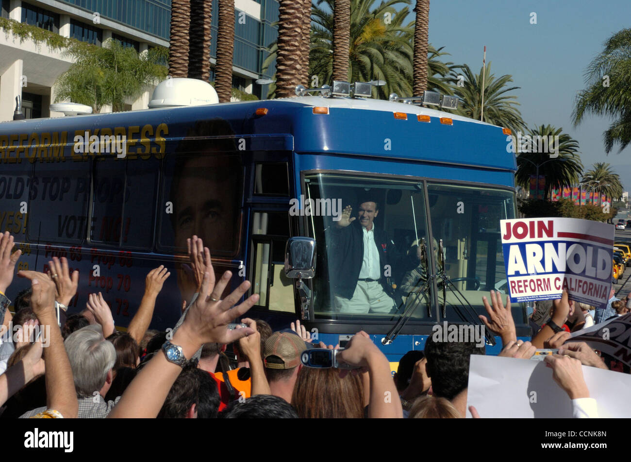 California Governor Arnold Schwarzenegger arrives at a stop on his