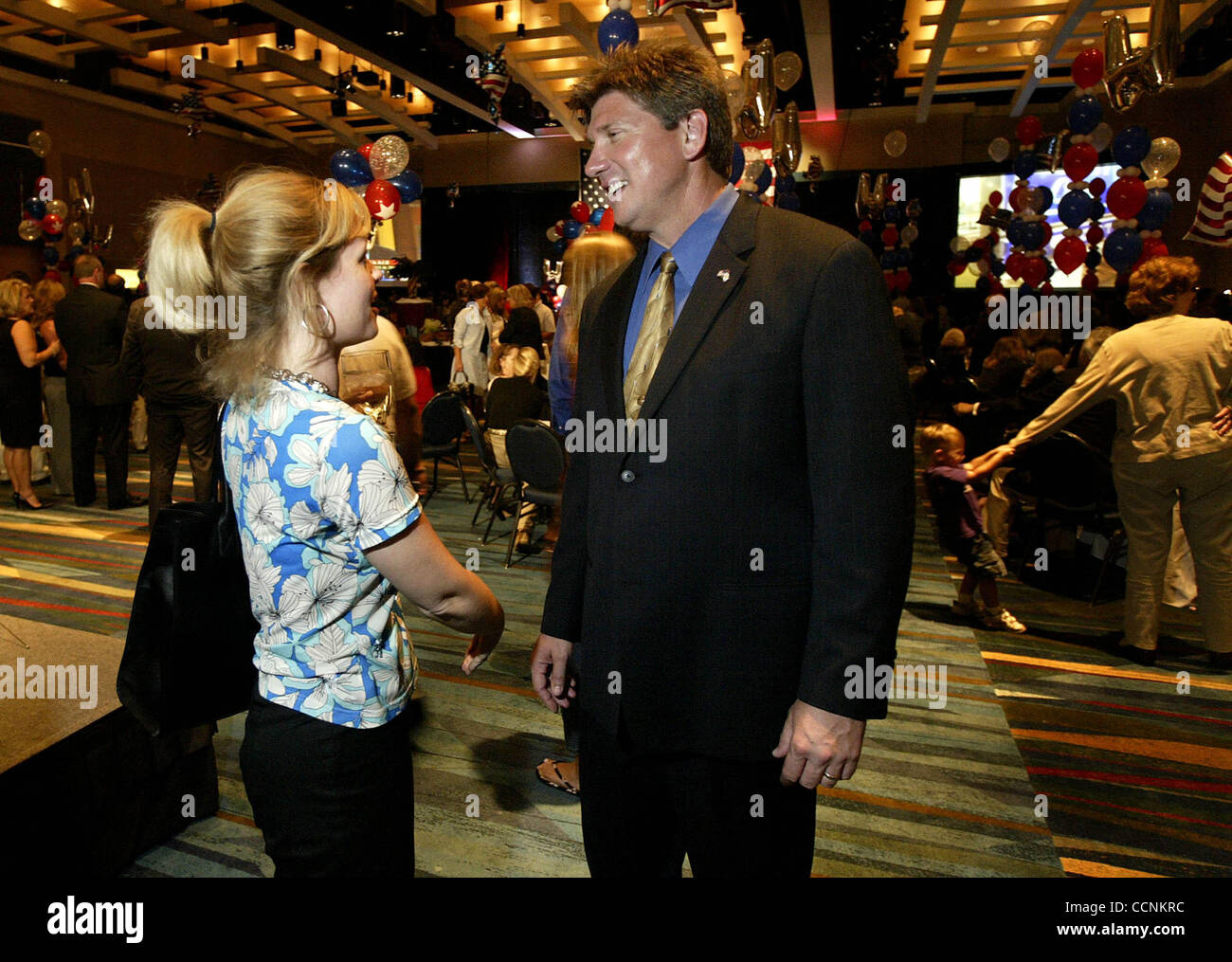 110204 met Edwards WEST PALM BEACH - Andy Edwards recieves support from Kelly Layman of Palm Beach during the Republican Victory Party at Palm Beach County Convention Center Tuesday night. Stock Photo