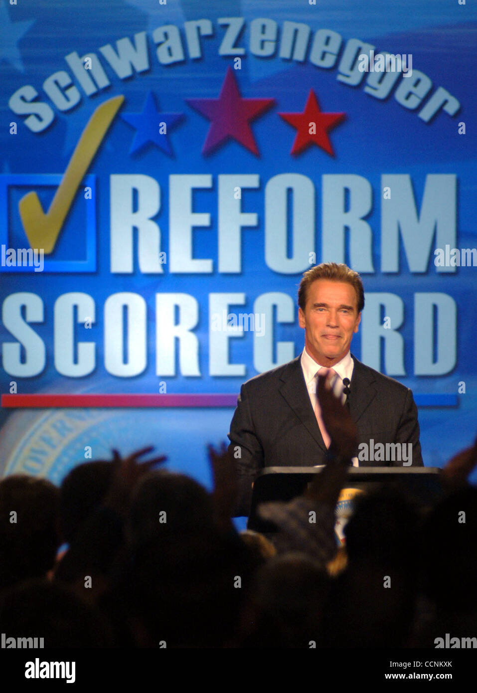 California Governor Arnold Schwarzenegger talks to the media and