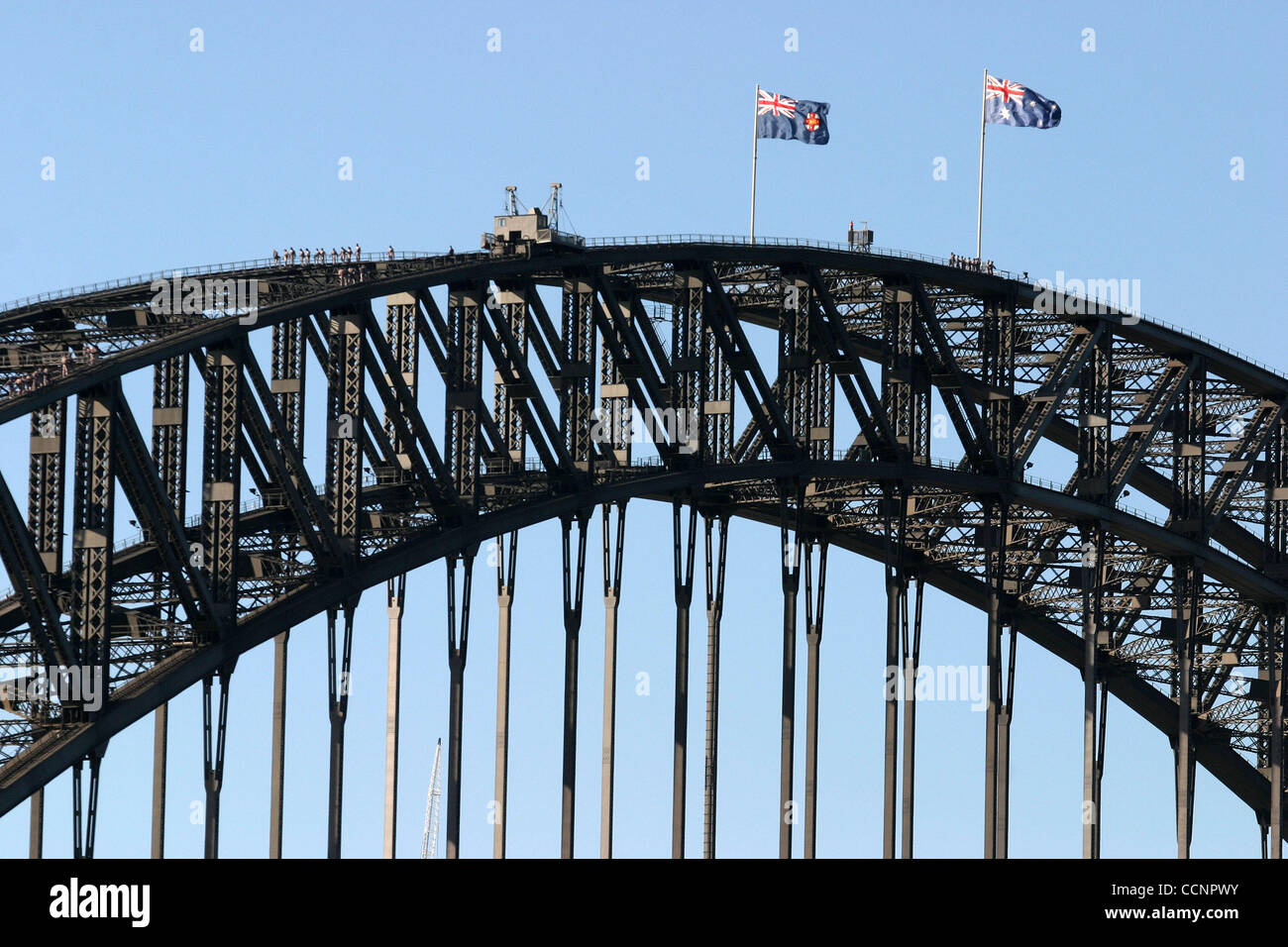 Nov 26, 2004; Sydney, New South Wales, AUSTRALIA; The Sydney Harbor bridge. A popular touritst attraction is to climb the bridge to the top. Stock Photo