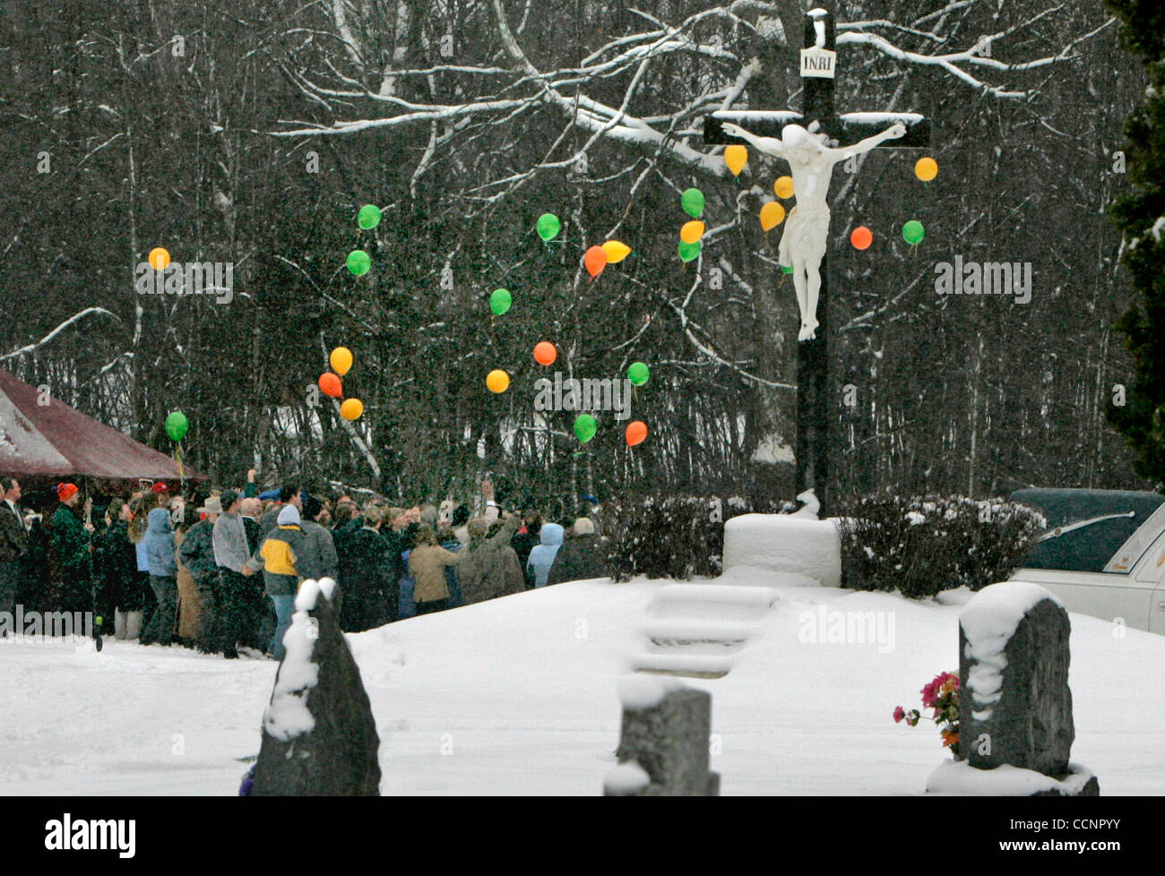 Jim Gehrz/Minneapolis Star Tribune Haugen, WI/November 27, 2004/3:30 PM Mourners release balloons at the graveside service for Allan Laski at the Bohemian National Cemetery in Haugen, WI, following a funeral service at Holy Trinity Catholic Church nearby. Stock Photo