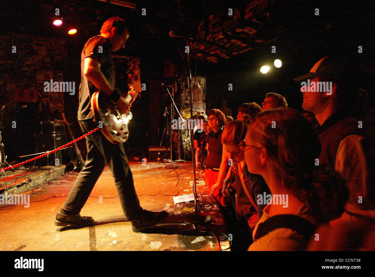 Oct 24, 2003; Manhatten, NY, USA; TED LEO of the 'Ted Leo Band' preforms at CBGB's on the Bowery in Manhattan for the CMJ music festival. Ted Leo, guitar and vocals, Dave Lerner, bass, Chris Wilson, drums. Stock Photo