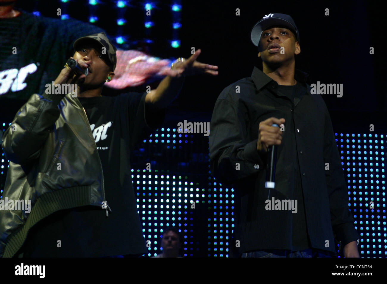 Pharrell Williams of The Neptunes and N.E.R.D. with Jay-Z at Jay-Z's  Madison Square Garden concert on Nov. 25th, 2003. Jay-Z is claiming this show was his final performance. Stock Photo