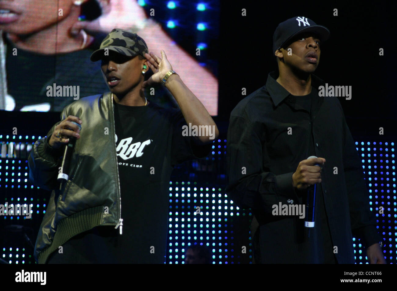 Pharrell Williams of The Neptunes and N.E.R.D. with Jay-Z at Jay-Z's  Madison Square Garden concert on Nov. 25th, 2003. Jay-Z is claiming this  show was his final performance Stock Photo - Alamy