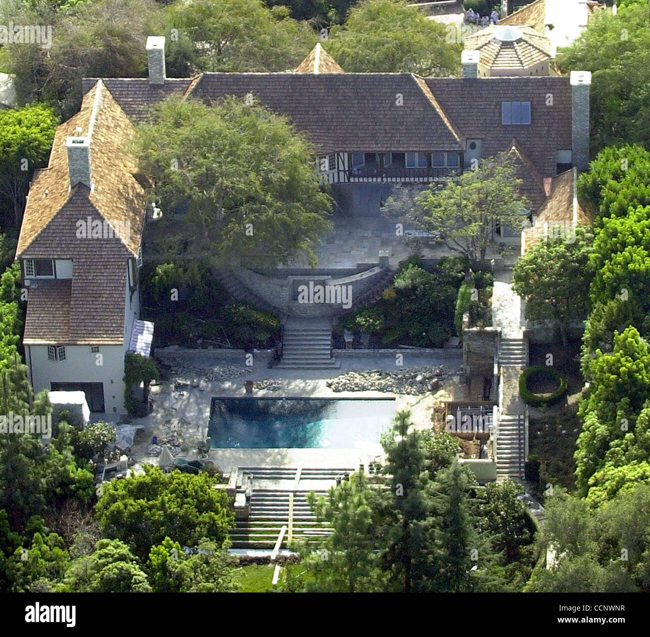 Jan 25, 2003; Beverly Hills, CA, USA; 18 months after they paid 3.5 million for this mansion, actors Brad Pitt and Jennifer Aniston have yet to move in. Pitt recently filed new plans with Beverly Hills city officials which include the addition of a 10-by-6-foot spa and a second-story gym. They are a Stock Photo