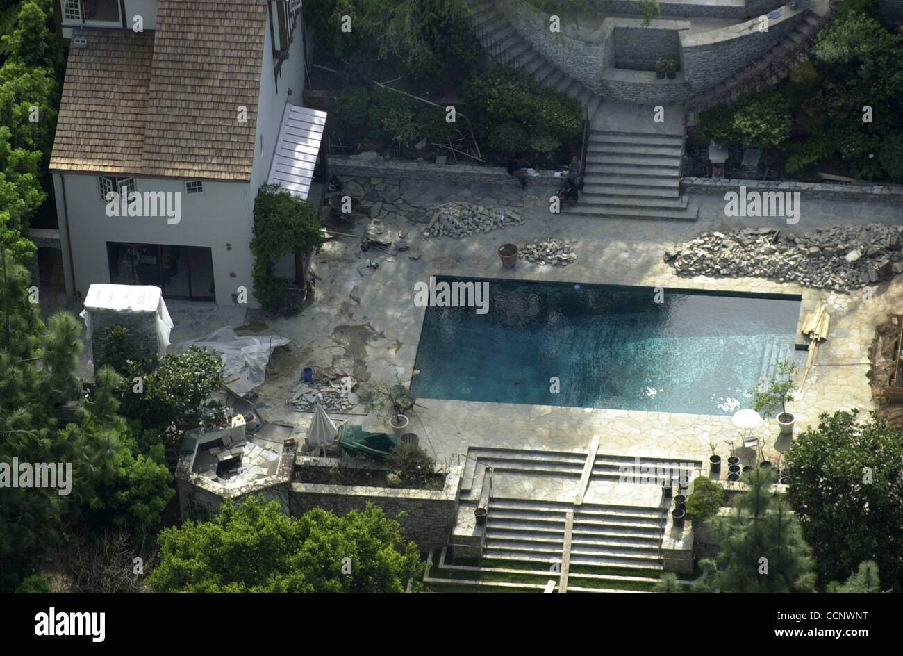 Jan 25, 2003; Beverly Hills, CA, USA; 18 months after they paid 3.5 million for this mansion, actors Brad Pitt and Jennifer Aniston have yet to move in. Pitt recently filed new plans with Beverly Hills city officials which include the addition of a 10-by-6-foot spa and a second-story gym. They are a Stock Photo