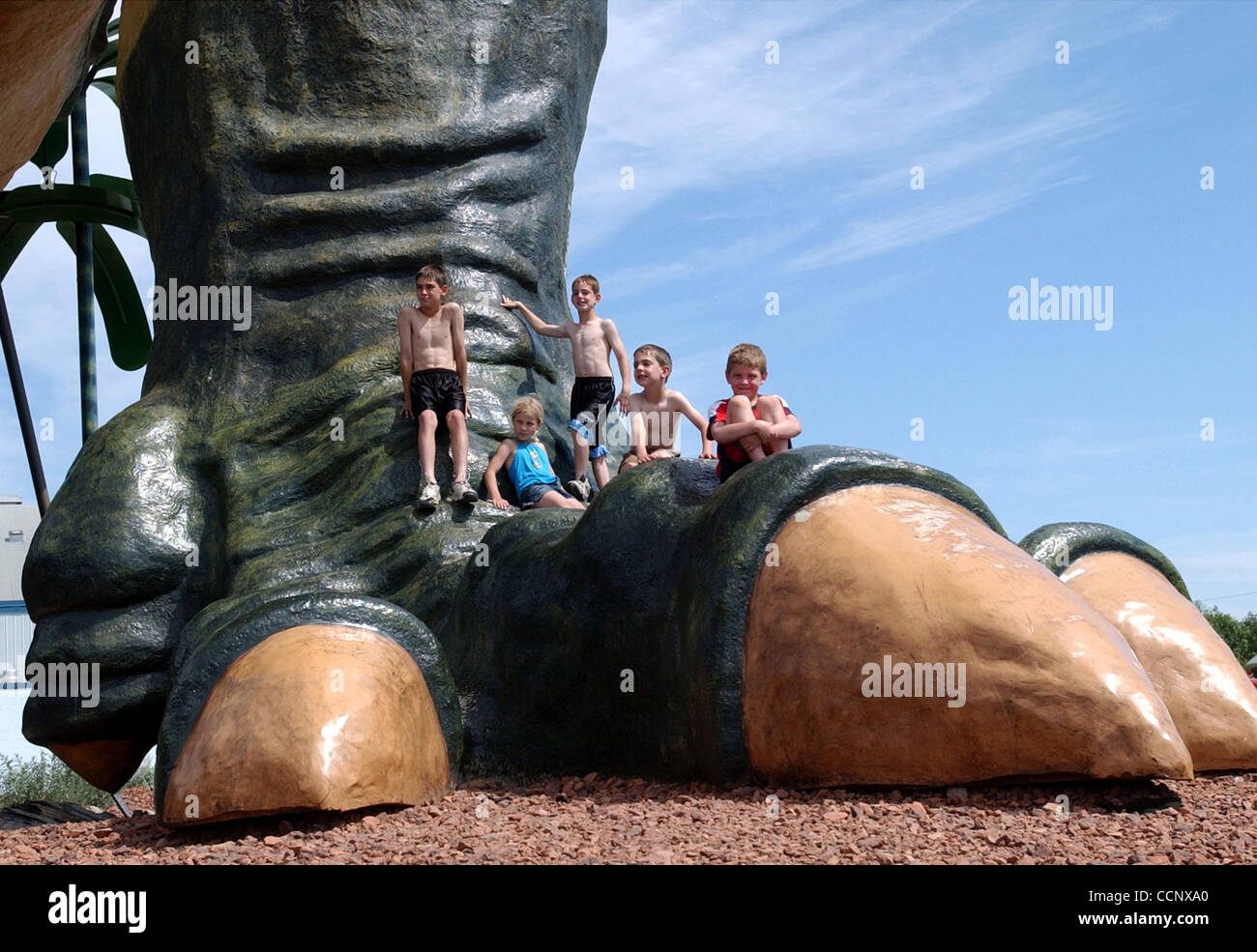 Jun 15, 2003 - Drumheller, Alberta, Canada - Children climb on the foot of  the world's largest dinosaur at a city park in Drumheller. The statue is 86  feet (26.2 meters) tall.