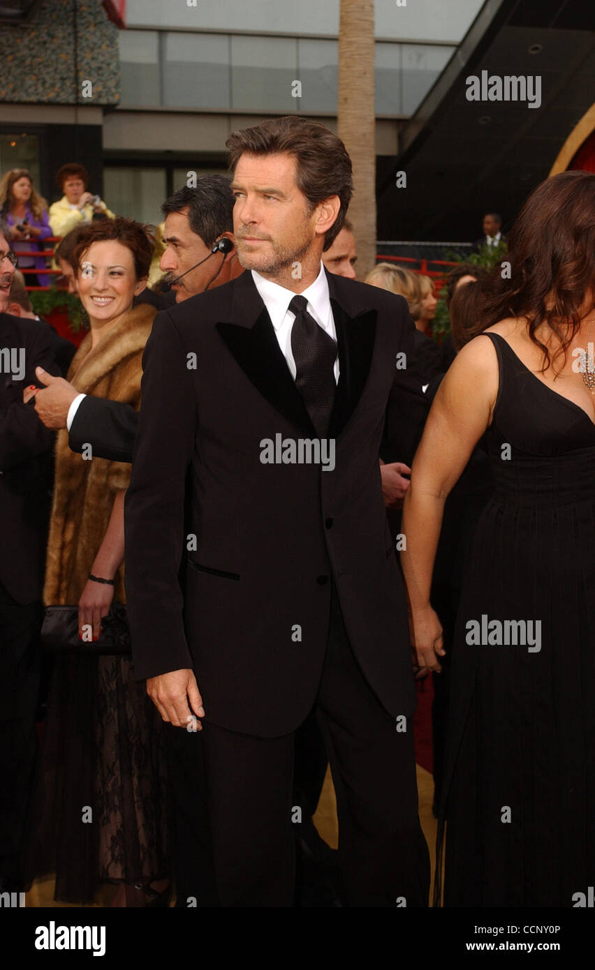 Feb 29, 2004; Hollywood, CA, USA; OSCARS 2004 Actor PIERCE BROSNAN and his wife, KEELY SHAYE