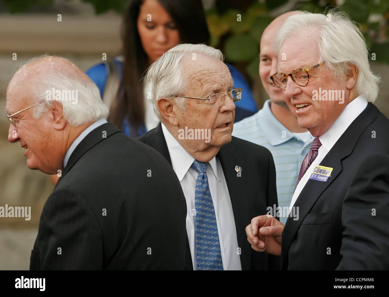 Retired Senator WENDELL FORD (center) talks with TERRY MCBRAYER (right