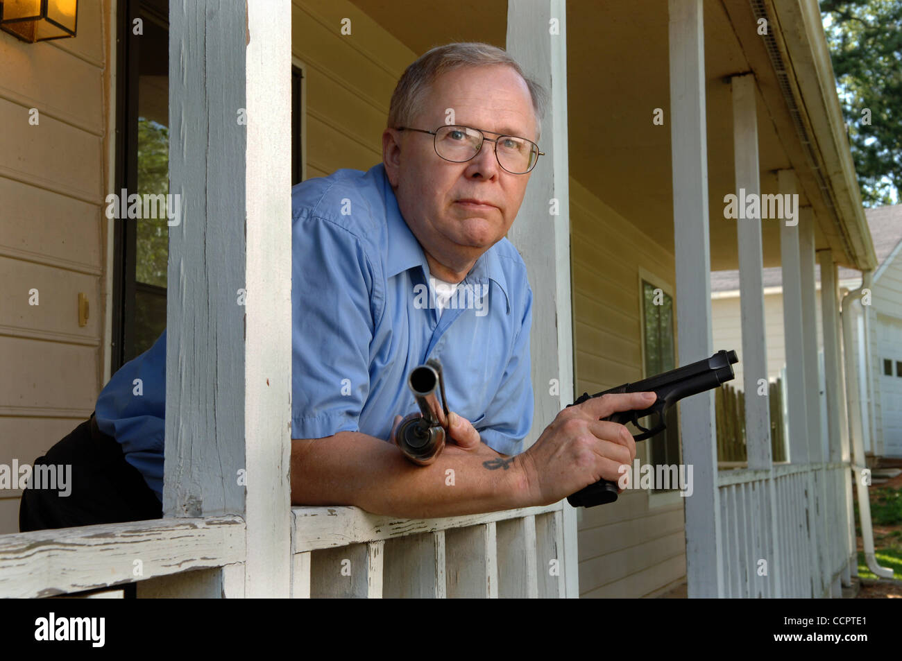 Oct. 2, 2010 - Kennesaw, GA, USA - Peder Fagerholm, a retired U.S. Naval officer and IBM executive, maintains several firearms for protection, in support of the town's ordinance requiring  each homeowner to do so. (Credit Image: © Robin Nelson/ZUMAPRESS.com) Stock Photo