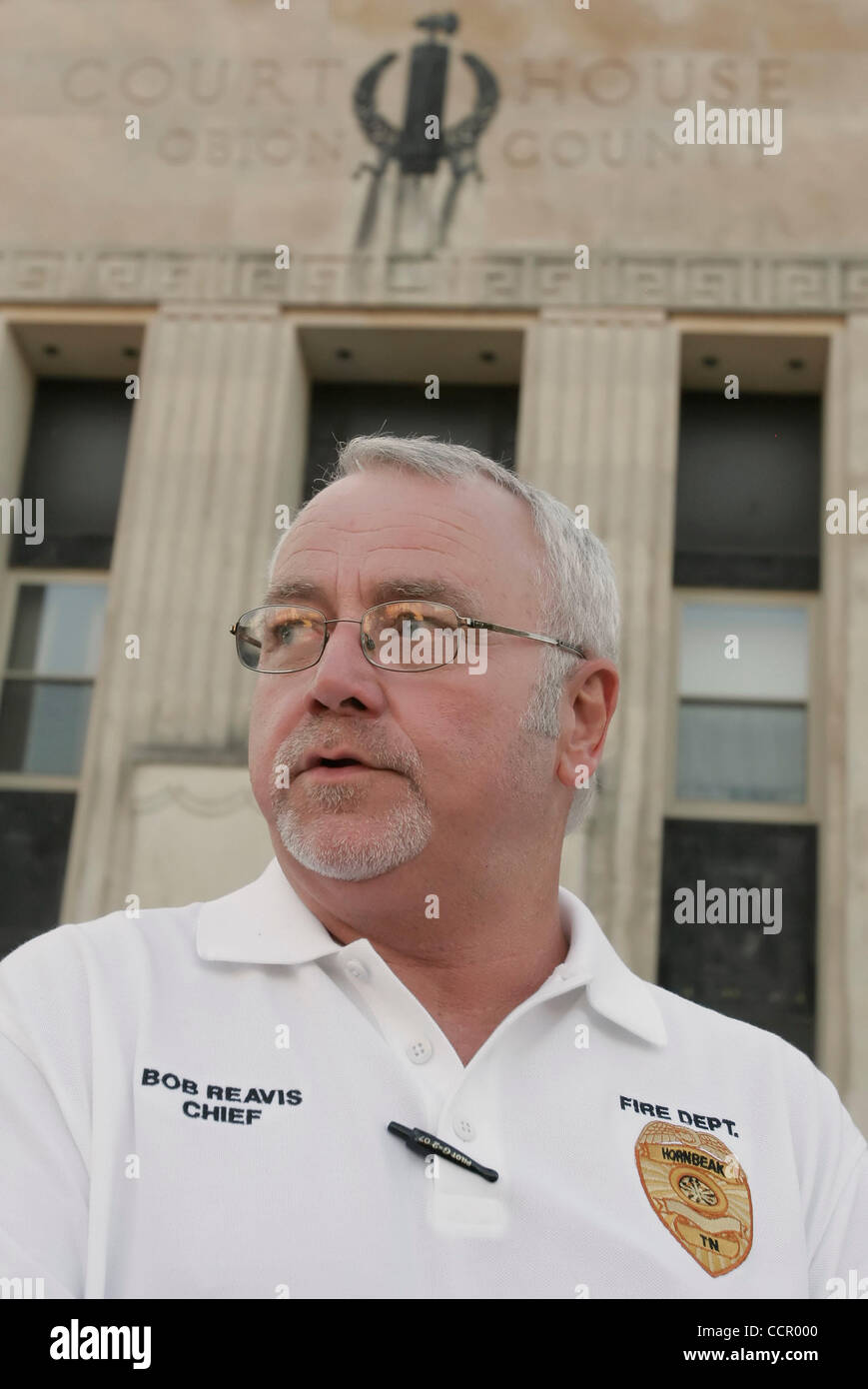 Hornbeak Volunteer Fire Department Chief BOB REAVIS talks to a reporter