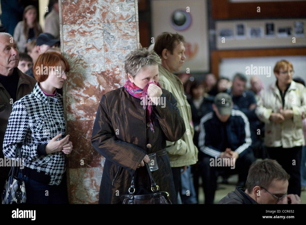 Death toll at Raspadskaya mine of Mezhdurechensk in Kemerovo region of Russia keeps rising, and has reached 47.The other miners who are trapped feared to be dead. Pictured: Relatives crying inside the Raspadskaya mine office . Stock Photo
