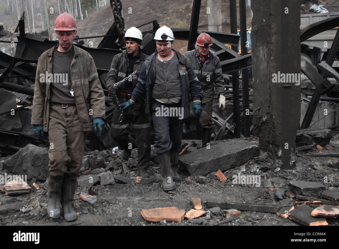 Death toll at Raspadskaya mine of Mezhdurechensk in Kemerovo region of Russia keeps rising, and has reached 60.The other miners who are trapped feared to be dead. Rescue operation is still on.  Pictured: miners outside the blasted Raspadskaya mine . Stock Photo