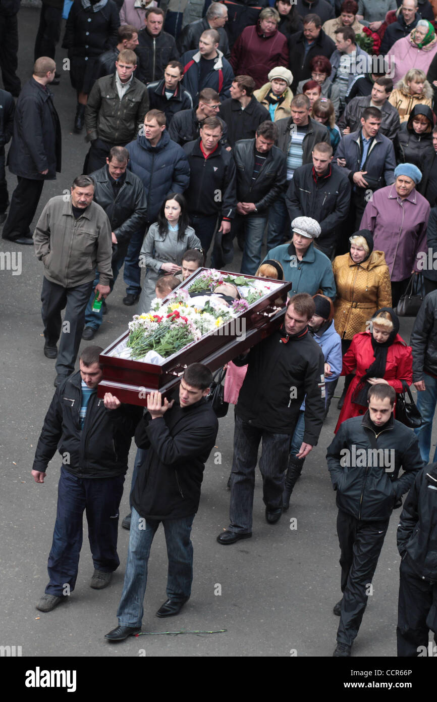 Death toll at Raspadskaya mine of Mezhdurechensk in Kemerovo region of Russia keeps rising, and has reached 47.The other miners who are trapped feared to be dead. Pictured: The first funerals of those who died at the Raspadskaya coalmine have been held in Mezhdurechensk. According to the Raspadskaya Stock Photo