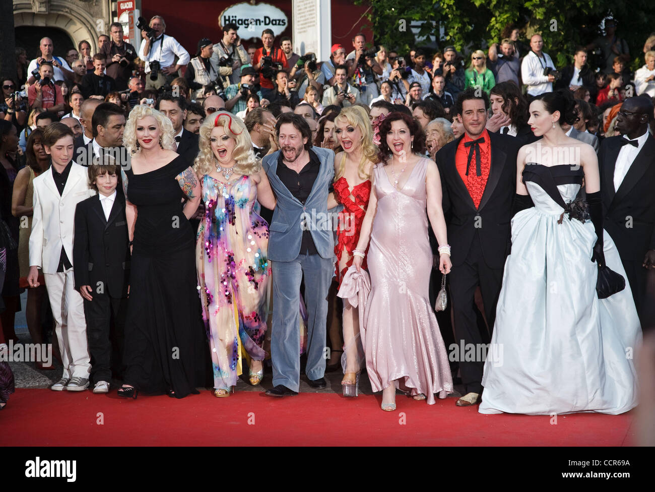 The opening ceremony of the Cannes Film Festival, May 12, 2010.Pictured: actress Dirty Martini and film director Mathieu Amalric (in centre) Stock Photo