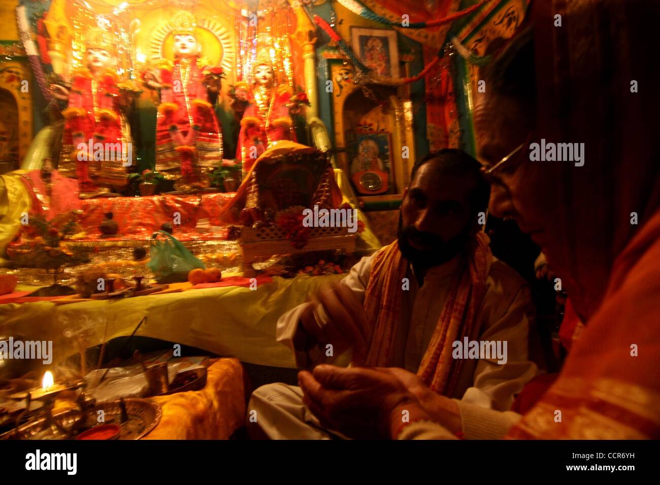 Mar 24, 2010 - Srinagar, Kashmir, India - Kashmiri Pandits worship inside a Ram temple during Ramnavmi in Srinagar, the summer capital of Indian Kashmir. Pandits, who did not migrate when members of the community left the valley in early 90s, celebrated Ram Navmi with religious fervour and gaiety th Stock Photo