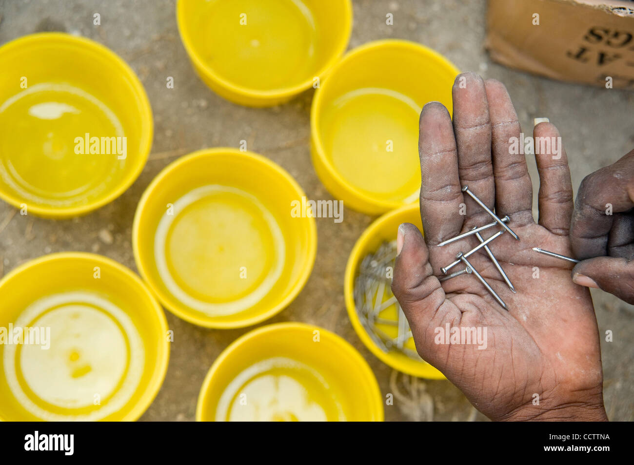March 3, 2010, Port au Prince, Haiti Locally hired workers count out