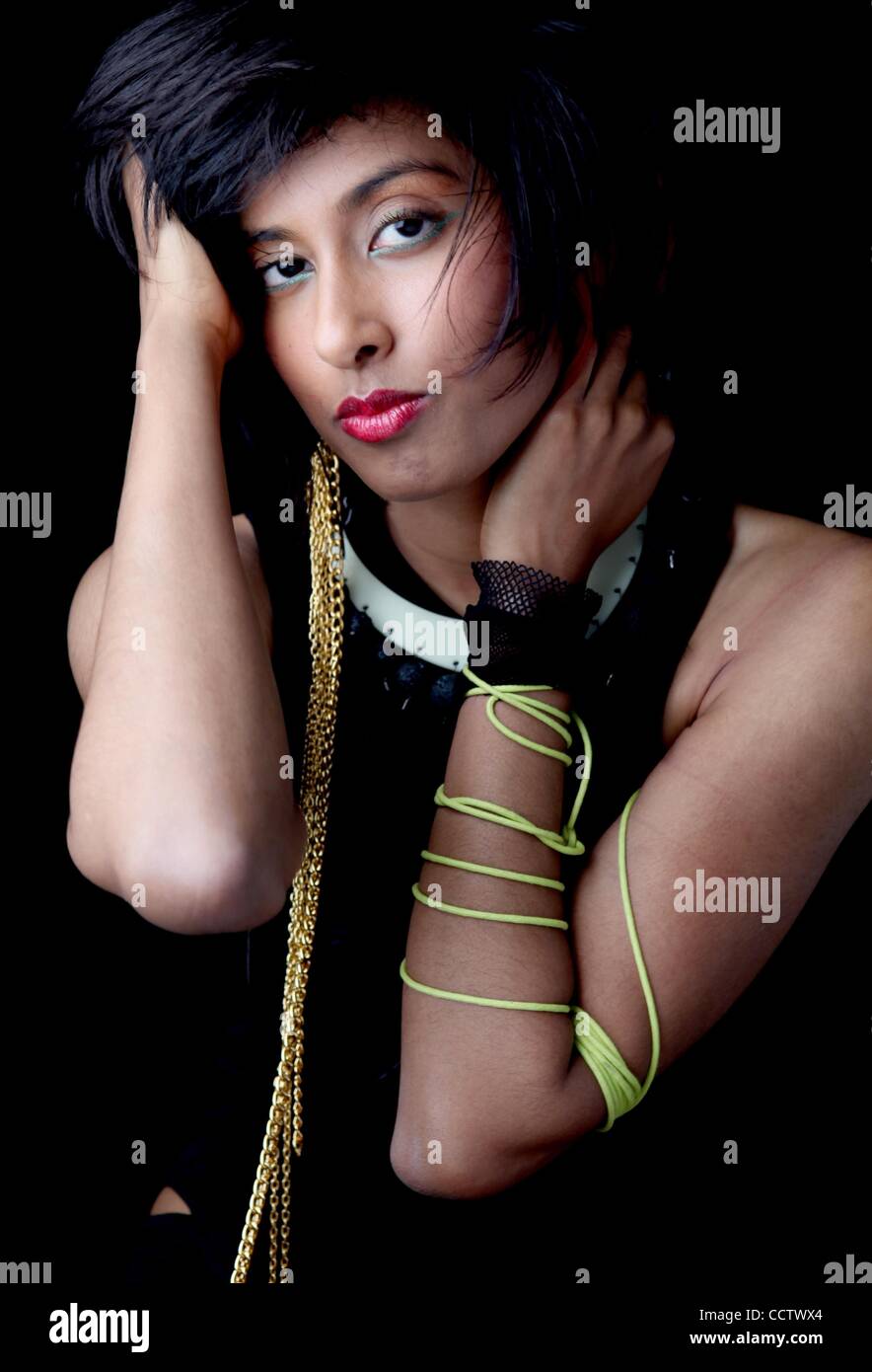 Apr 18, 2010 - Los Angeles, California, USA - Studio Portrait Session of ANJULIE PERSAUD, better known as ANJULIE is a Canadian singer/songwriter from Oakville, Ontario Canada, a suburb outside of Toronto. Anjulie wrote the single 'Don't Call Me Baby' by Canadian recording artist Kreesha Turner whic Stock Photo