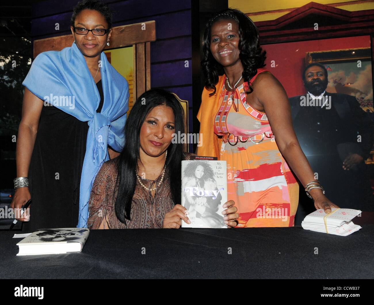 May 06, 2010 - Philadelphia, Pennsylvania, U.S. - Publicists LINDA DUGGINS & VANESSE SAGMBOTI with actress PAM GRIER known for her roles as 'Foxy Brown' and 'Jackie Brown' arrives at the African American Museum for a book signing of her new memoir, 'Foxy: My Life in Three Acts'. (Credit Image: Â© Ri Stock Photo