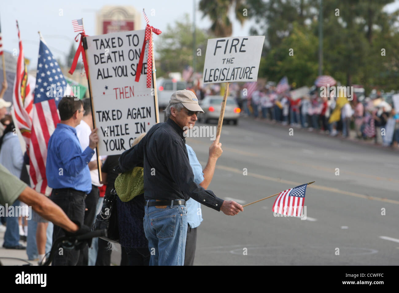 Thousands of protesters line both sides of Escondido Avenue during a Tea Party rally against taxes in Escondido on Thursday. Photo Hayne Palmour IV Stock Photo