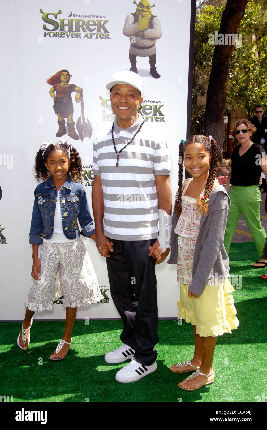 May 16, 2010 - Hollywood, California, U.S. - Aoki Simmons, Rusell Simmons and Ming Simmons during the premiere of the new movie from Dreamworks, SHREK FOREVER AFTER, held at the Gibson Amphitheatre, on May 16, 2010, in Los Angeles.. 2010.K64841MGE(Credit Image: Â© Michael Germana/Globe Photos/ZUMApr Stock Photo