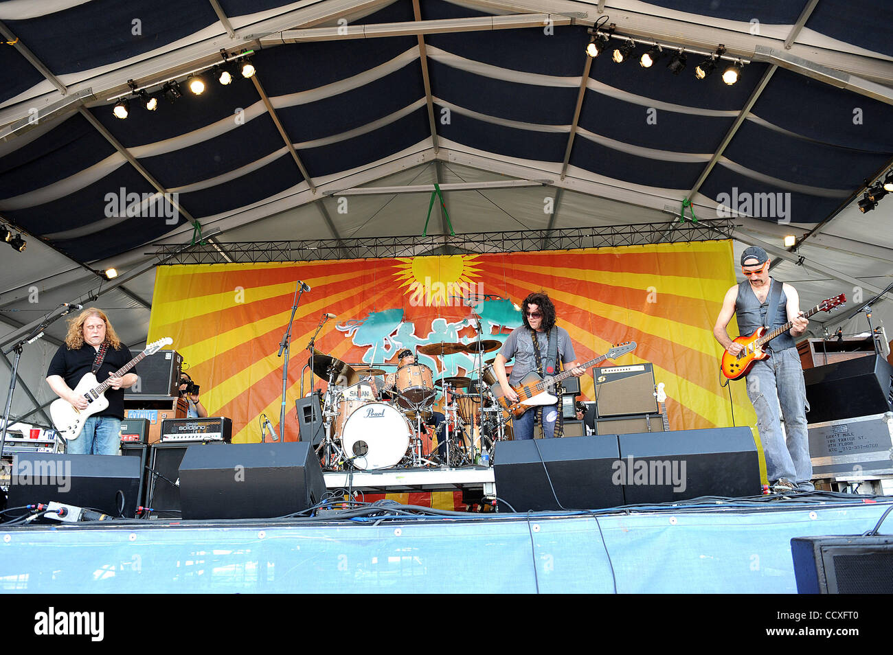 Apr 29, 2010 - New Orleans, Louisiana; USA -  (L-R) Singer / Guitarist WARREN HAYNES, Drummer MATT ABTS, Bass Guitarist JORGEN CARLSSON and Keyboardist / Guitarist DANNY LOUIS of the band Gov't Mule as they  performs live as part of the 2010 New Orleans Jazz & Heritage Festival that is taking in New Stock Photo
