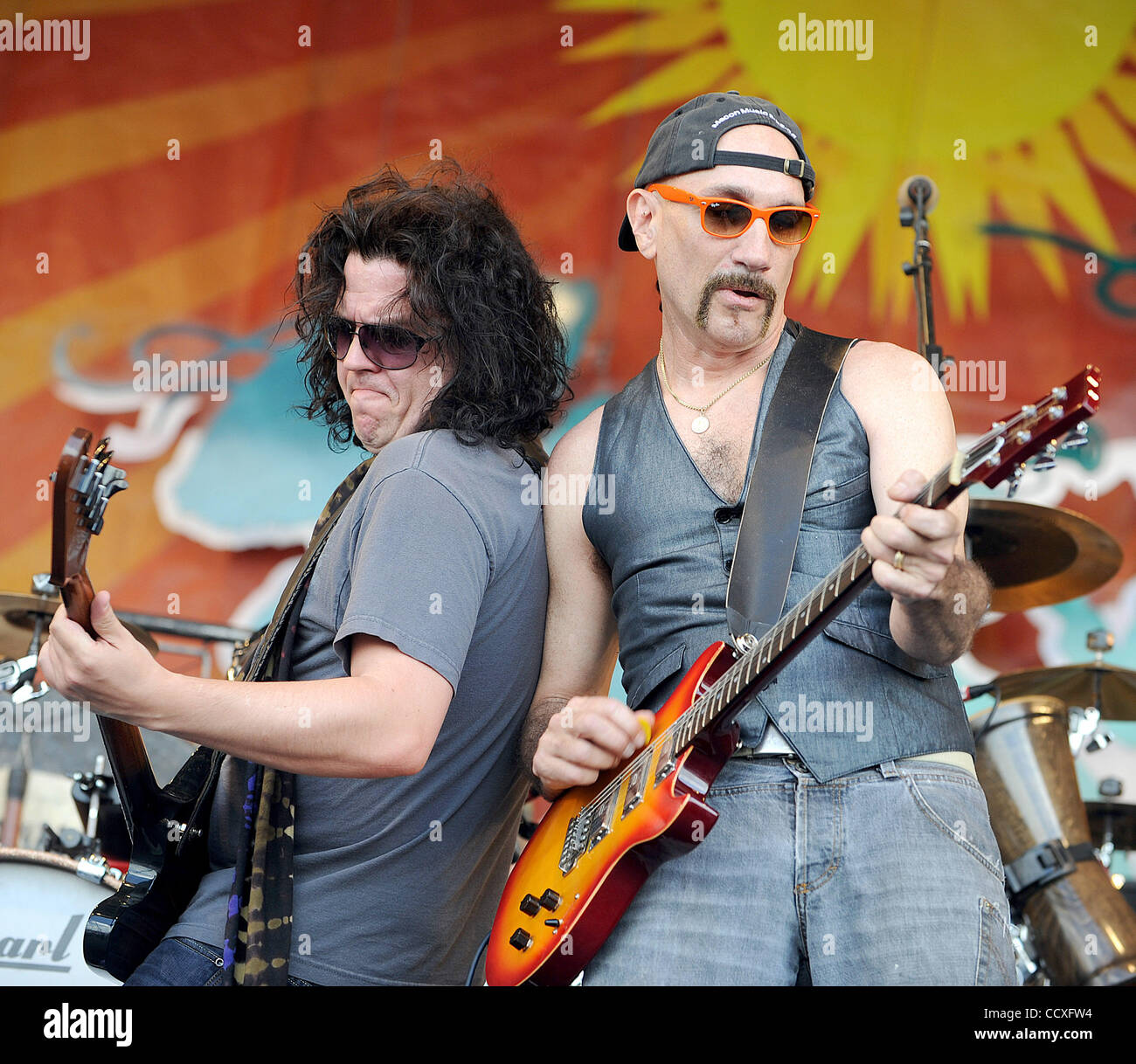 Apr 29, 2010 - New Orleans, Louisiana; USA -  (L-R) Bass Guitarist JORGEN CARLSSON and Keyboardist / Guitarist DANNY LOUIS of the band Gov't Mule as they  performs live as part of the 2010 New Orleans Jazz & Heritage Festival that is taking in New Orleans Race Track. Copyright 2010 Jason Moore. Stock Photo