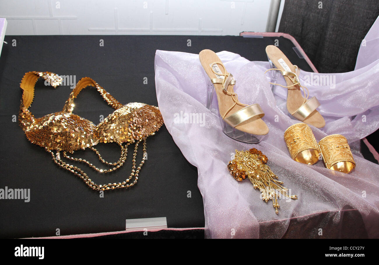 A view of a gold sequenced beaded bra, Fredericks of Hollywood heels, gold bracelets and gold sequenced beaded hair barrette worn by Larry Birkhead's former partner ANNA NICOLE SMITH. Auctioned items sold will  benefit his daughter Dannielynn's future and charity. The auction will take place on June Stock Photo