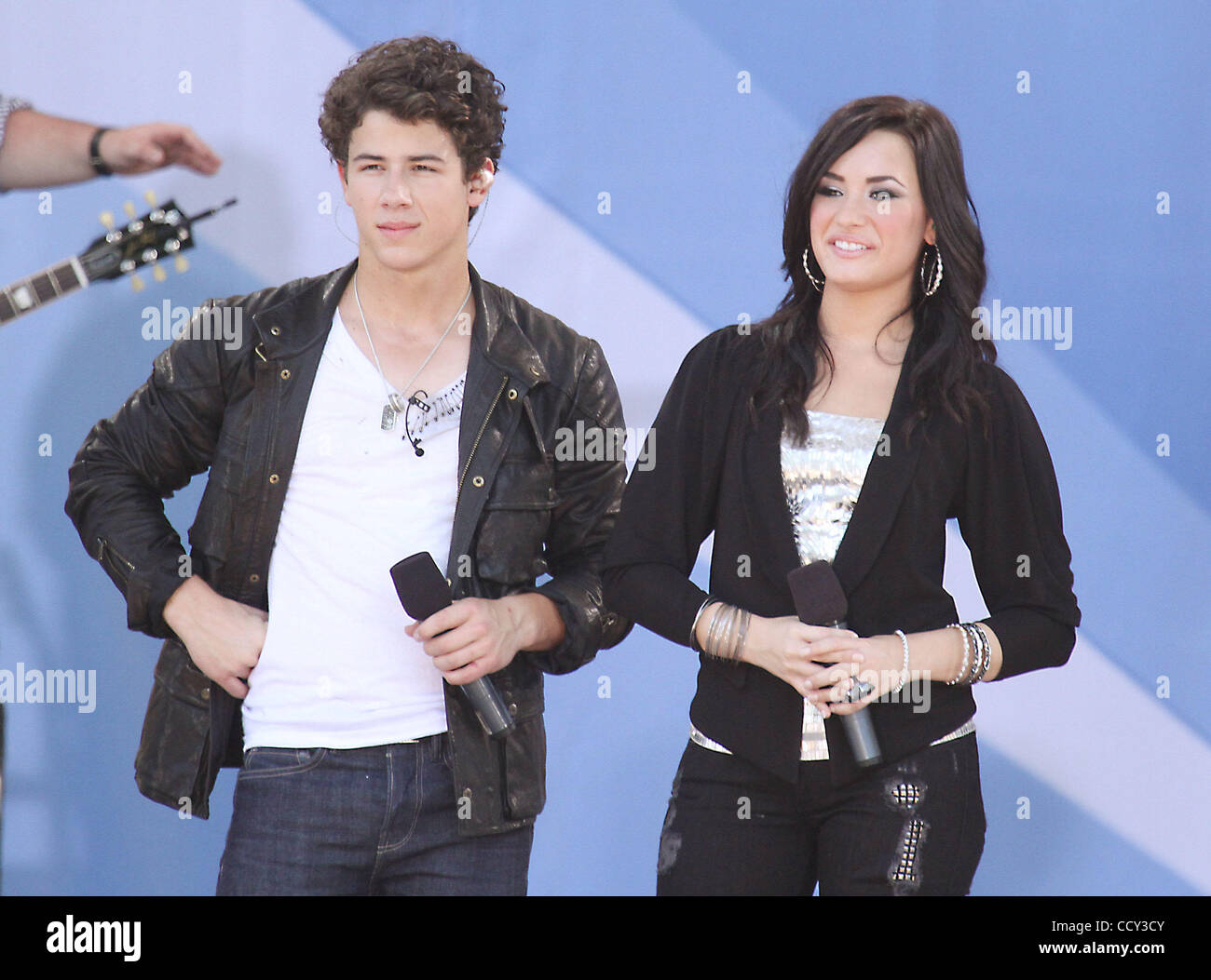 NICK JONAS from the band the Jonas Brothers and singer DEMI LOVATO kick-off  the 'Good Morning America' Summer 2010 concert series held at Rumsey  Playfield in Central Park Stock Photo - Alamy