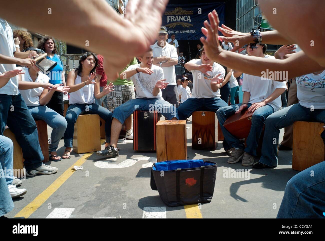 April 10, 2010 - Lima, Peru - Young Peruvians, playing cajons (drums), participate in 'Cajoneada,' a musical concert to open the III International Festival of the Peruvian 'Cajon.' The festival features a series of free concerts and musical clinics (April 10 - 17, 2010) that explores Afro-Peruvian m Stock Photo