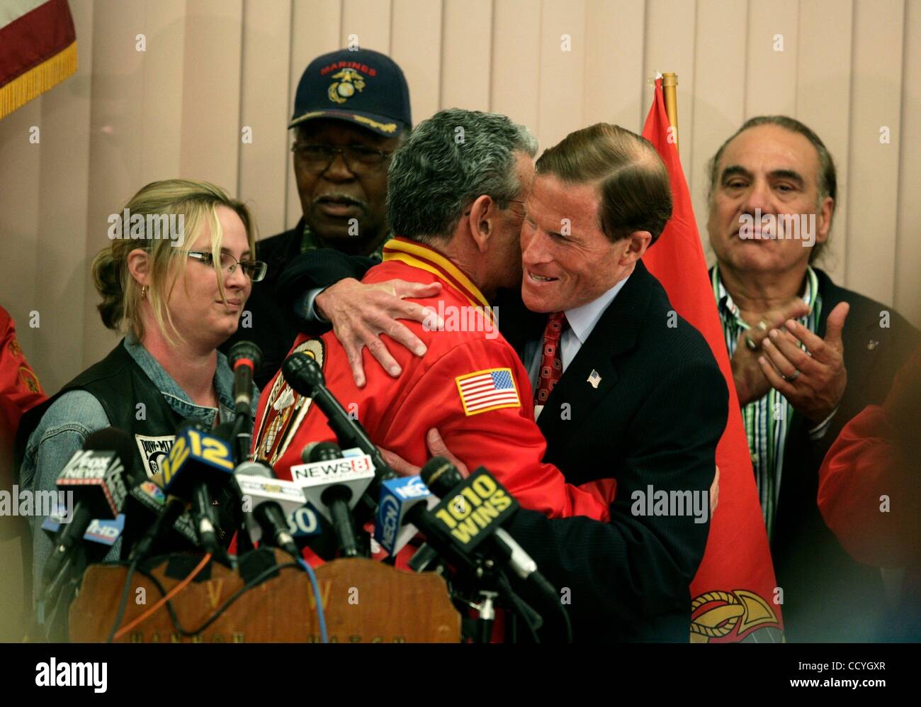 May 18, 2010 - West Hartford, Connecticut, U.S. - CT Attorney General and Democratic candidate for the United States Senate RICHARD BLUMENTHAL is surrounded veterans and hugs PETER GALGANO of the Marine Corps League of CT as he defends himself against allegations that he misstated his military recor Stock Photo